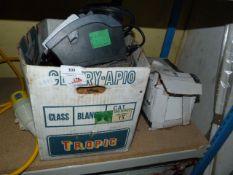 Box containing fax machine, tiles, etc