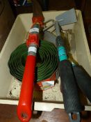 Box containing garden tools