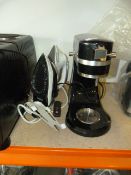Two irons, one mixer and a torch