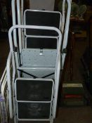 Three domestic step ladders and clothes horse