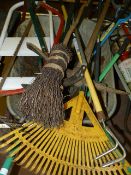Wheelbarrow containing assorted gardeners tools, etc