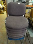 Seven stackable office chairs