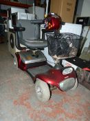 Sterling mobility scooter, key, charger and document in office