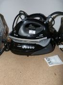 Two swan 2200 watt steam irons