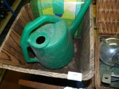 Wooden planter and watering can