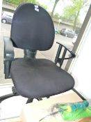 Black upholstered office swivel chair