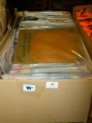 Box containing assorted fancy dress facial hair, etc