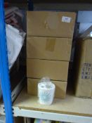 *Eight boxes containing toothbrush holders