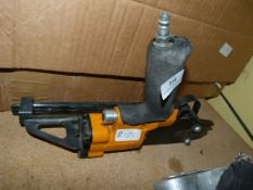 Nail gun and box containing nails