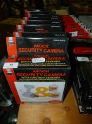 *Eight mock security cameras with two motion sensors