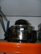 Three assorted slow and pressure cookers