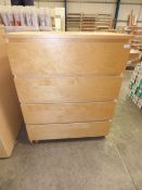 *Beech effect four drawer chest of drawers