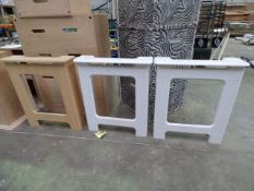 *Three unfinished radiator covers