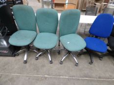 *Four upholstered office swivel chairs (3 green and one blue)