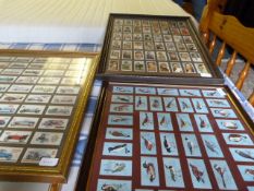 Three Framed Collections of Cigarette Cards Depicting; Motor Vehicles, Sports Persons and Wild Birds