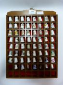 Collection of Decorative China Thimbles in Rack