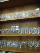 Quantity of Assorted Glassware Over Three Shelves