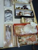 Eleven Boxed Porcelain Headed Dolls