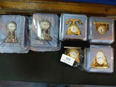 Six Miniature Clocks