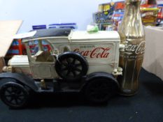 Cast Iron Coca-Cola Lorry and a Brass Coca-Cola Bottle