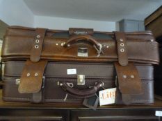 Two Leatherette Suit Cases