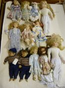 Twelve Porcelain Headed Dolls