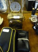 Two Mantel Clocks and Two Cameras