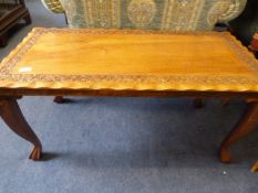 Carved Teak Occasional Table With Ball and Claw Feet