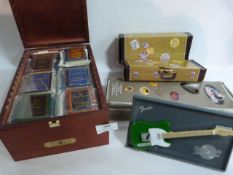 Four Miniature Guitars and a Box Containing Miniature Classic Novels