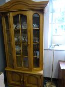 Light Oak and Glass Display Cabinet Over Cupboard