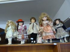 Collection of Five Porcelain Headed Dolls