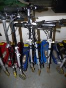 *Five Blue Electric Flyer Scooters