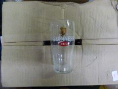 Box Containing Twenty Four Branded Guinness Pint Glasses