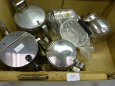 Box Containing Three Teapot and a Coffee Jug
