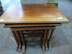 Nest of Three Mahogany Tables