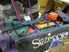 Bag Containing Hockey Sticks