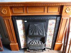 Pine Fireplace with Ornate Tiles