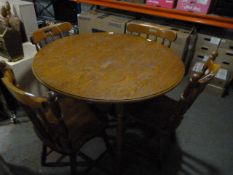 Circular Kitchen Table with Four Spindle Back Chairs