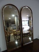 Two Bevelled Glass Arch Top Mirrors