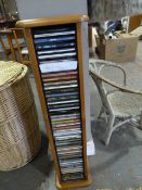 Pine CD Rack Containing Various CD's