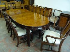 Oriental Style Oval Extending Dining Table with Two Leaves and Eight High Back Dining Chairs with