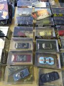 Fourteen Boxed 007 Cars