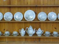 Oriental Style Tea Service Comprising of Six Cups and Saucers, Six Side Plates, One Cake Plate,