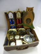 Small Suitcase of Various Clocks