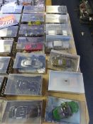 Fourteen Boxed 007 Cars