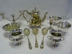 Two Shelves of Silver Plates