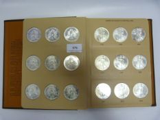 Collection of American Eagle Silver Dollars in Book and Case