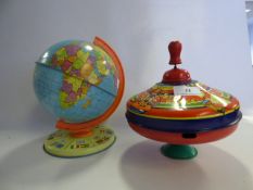 Globe and a Tin Spinning Top