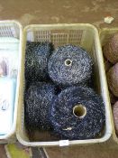 *Six Cones of Black and Silver Knitting Wool