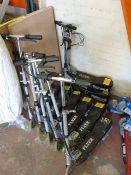 *Eight Black Flyer Scooters